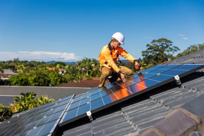 Solar panels with technician